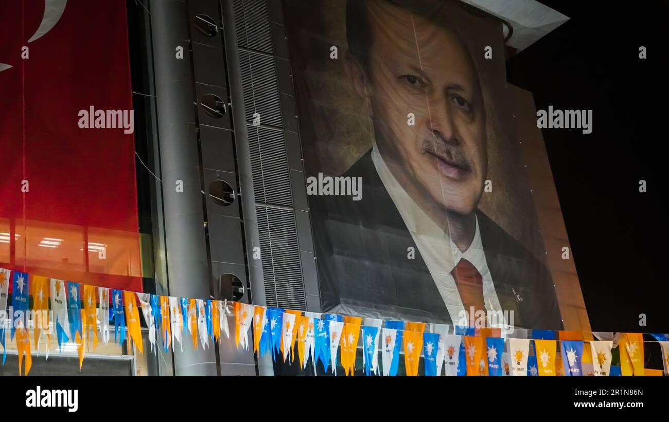 Izmir, Turkey. 15th May, 2023. AK Party supporters are watching live updates of the Turkish 2023 General Elections at midnight in front of the AK Party Izmir Provincial Presidency. Erdogan leads with 49.49% of the vote, Kilicdaroglu takes 44.79% of the vote after 91.93% of ballots were counted, the head of Turkey's Supreme Election Council said in early Monday. (Photo by Idil Toffolo/Pacific Press) Credit: Pacific Press Media Production Corp./Alamy Live News Stock Photo