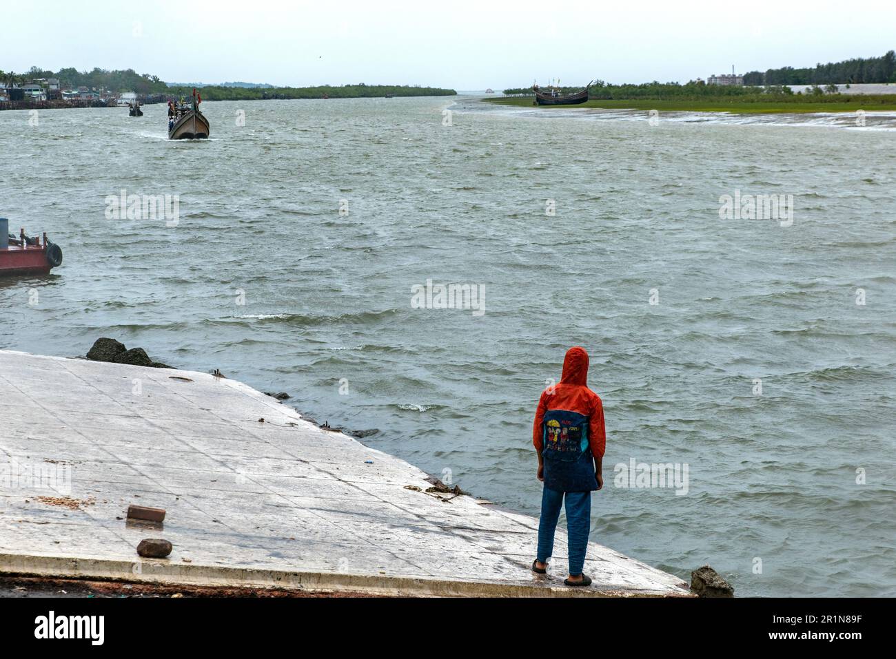 Cyclone Mokha has hit Myanmar hard. A part of its center passed over the island of St. Martin in Bangladesh. But coming from the sea to the ground, Mokha becomes much weaker. Due to this, there was no major damage. Cox's Bazar district administration had taken all kinds of preparations to deal with cyclone Mokha. Residents of the coastal areas were moved to shelters due to the fear of strong storm. Among them, there are more residents of Cox's Bazar's Nazirartek, Samitypara, Maheshkhali's Dhalghata, Sonadia, Gharibhanga and Qutubjom, Teknaf's Baharchhara, Shahpari Island and St. Martin Island. Stock Photo