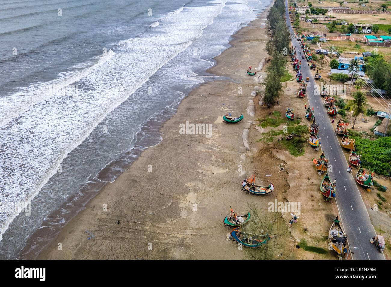 Cyclone Mokha has hit Myanmar hard. A part of its center passed over the island of St. Martin in Bangladesh. But coming from the sea to the ground, Mokha becomes much weaker. Due to this, there was no major damage. Cox's Bazar district administration had taken all kinds of preparations to deal with cyclone Mokha. Residents of the coastal areas were moved to shelters due to the fear of strong storm. Among them, there are more residents of Cox's Bazar's Nazirartek, Samitypara, Maheshkhali's Dhalghata, Sonadia, Gharibhanga and Qutubjom, Teknaf's Baharchhara, Shahpari Island and St. Martin Island. Stock Photo