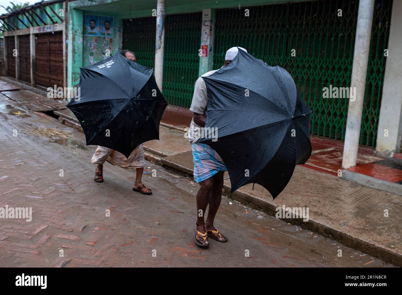 Cyclone Mokha has hit Myanmar hard. A part of its center passed over the island of St. Martin in Bangladesh. But coming from the sea to the ground, Mokha becomes much weaker. Due to this, there was no major damage. Cox's Bazar district administration had taken all kinds of preparations to deal with cyclone Mokha. Residents of the coastal areas were moved to shelters due to the fear of strong storm. Among them, there are more residents of Cox's Bazar's Nazirartek, Samitypara, Maheshkhali's Dhalghata, Sonadia, Gharibhanga and Qutubjom, Teknaf's Baharchhara, Shahpari Island and St. Martin Island. Stock Photo