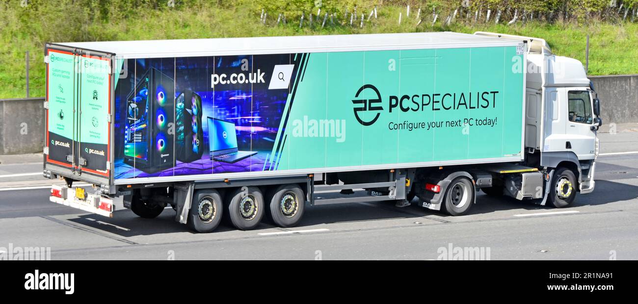 DAF CF white lorry power unit on hgv truck & articulated semi trailer advertising for PCSpecialist a business name configure your own new PC online UK Stock Photo