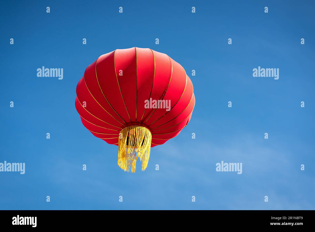 Chinese red lantern against blue sky. Copy space Stock Photo - Alamy