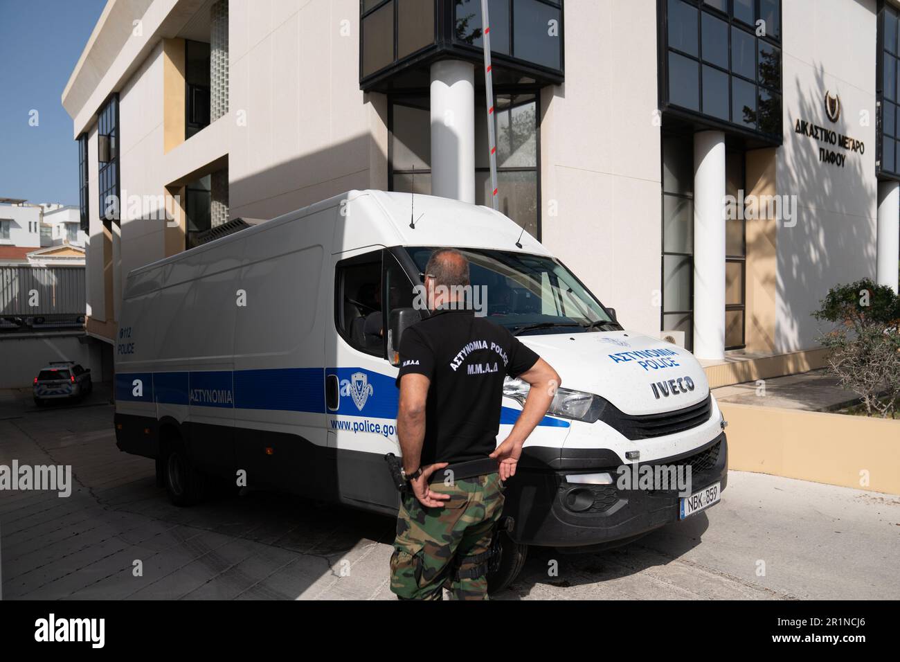 Custody vans arrive at Paphos District Court in Cyprus where David