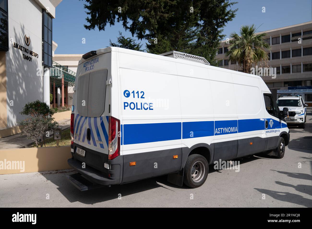 Custody vans arrive at Paphos District Court in Cyprus where David