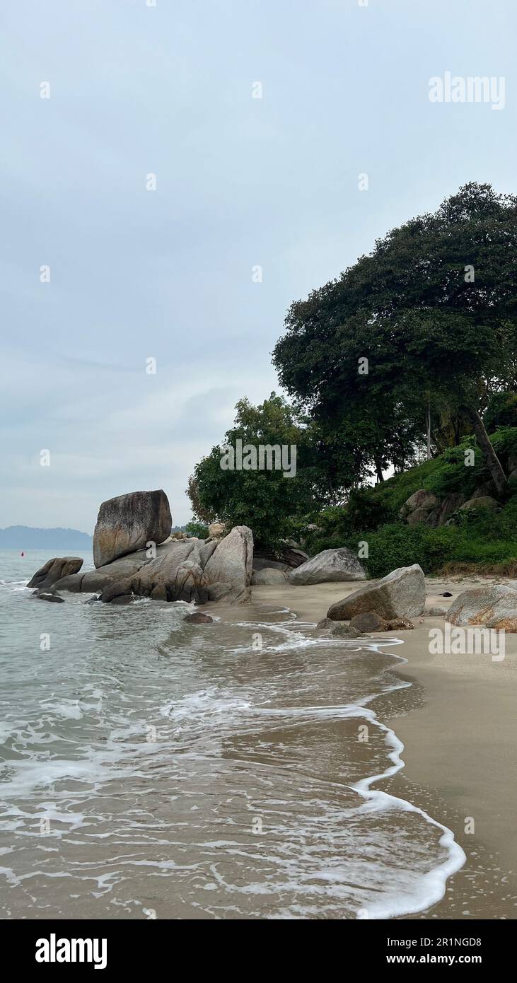 The large rocks on a sandy beach Stock Photo - Alamy