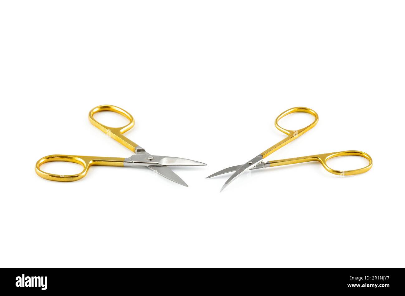 Gold silver metal nail scissors. Small metal manicure scissors isolated ...