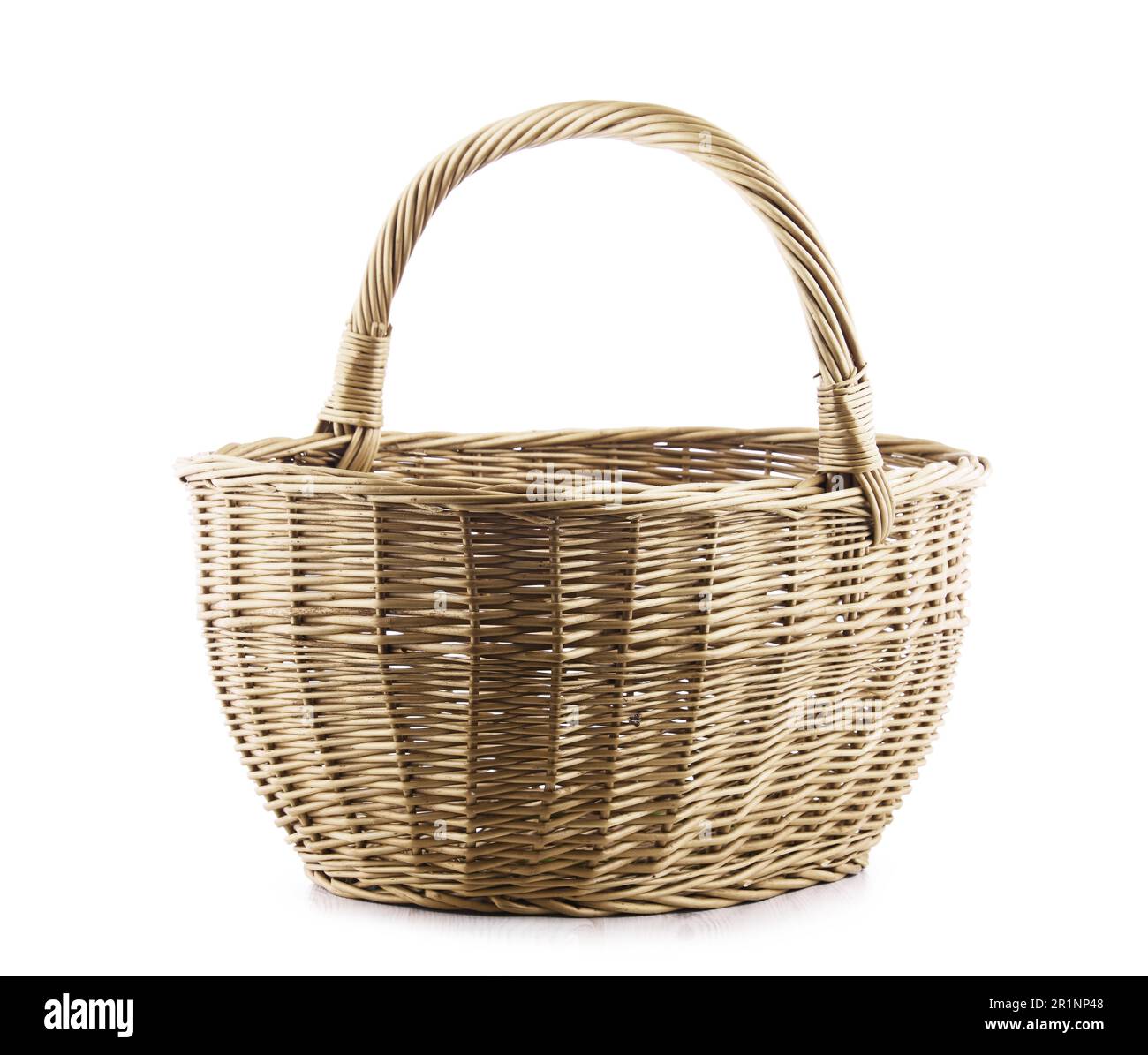Empty wicker basket isolated on white background Stock Photo - Alamy