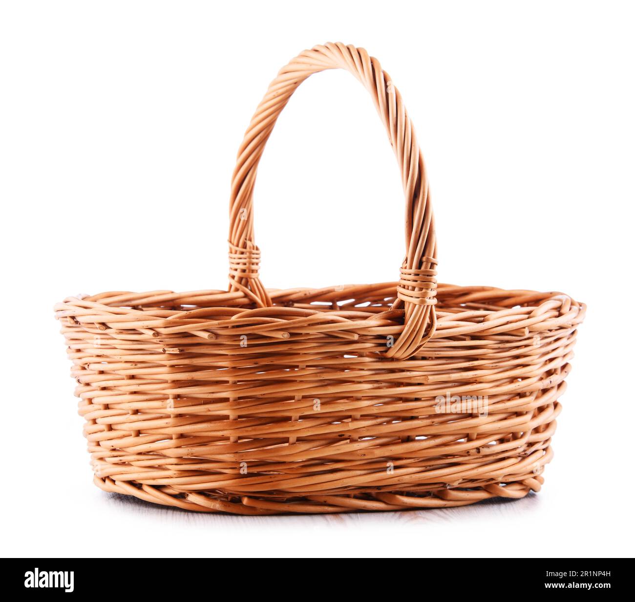 Empty wicker basket isolated on white background Stock Photo - Alamy