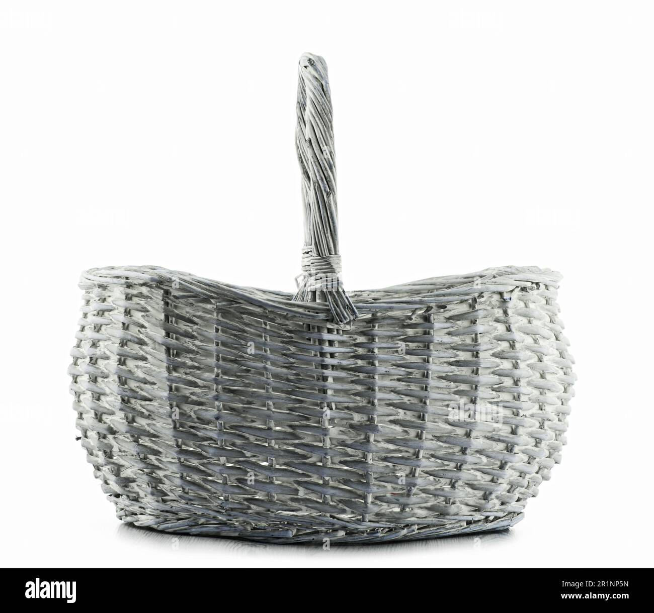 Empty wicker basket isolated on white background Stock Photo - Alamy