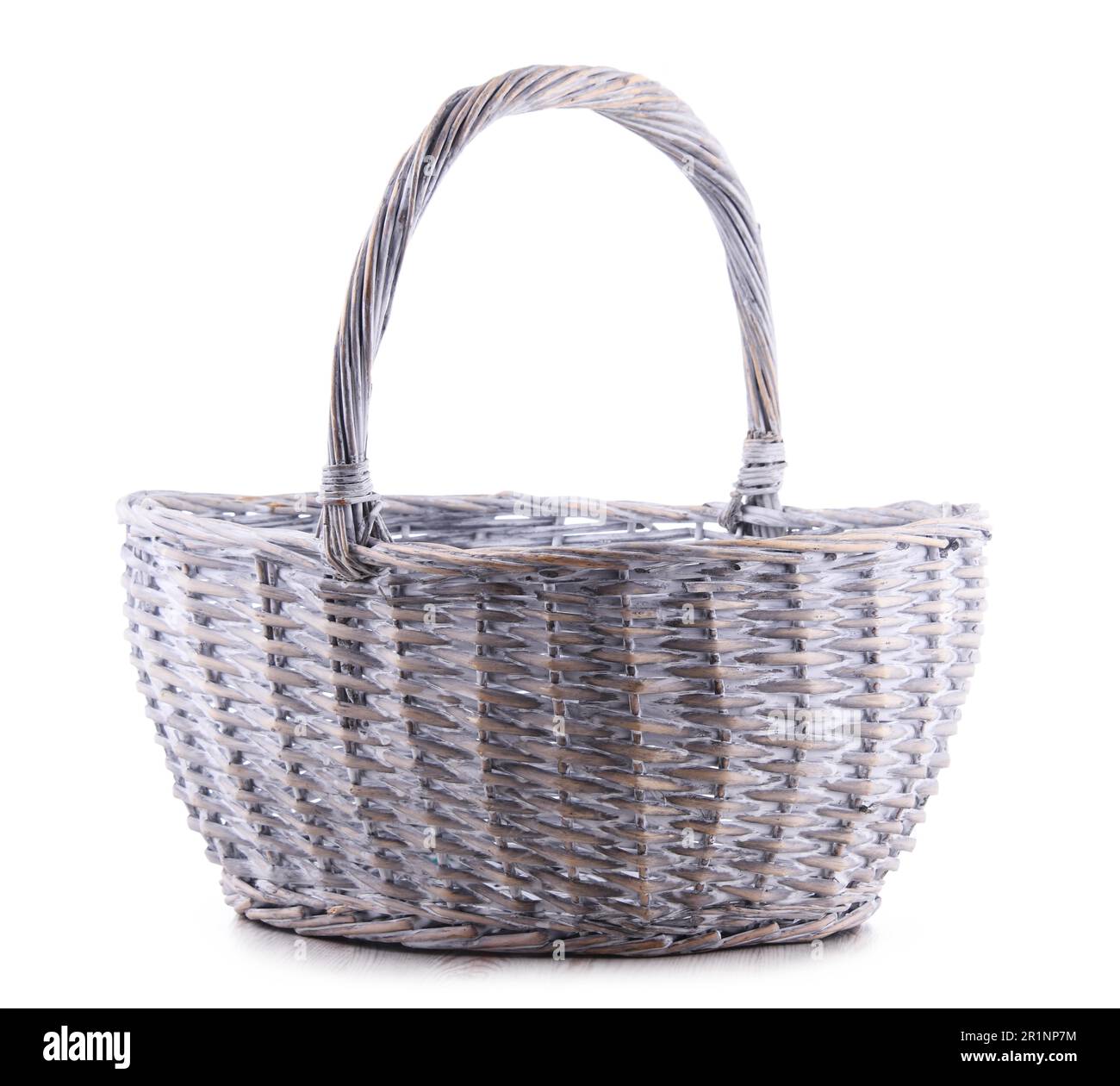 Empty wicker basket isolated on white background Stock Photo - Alamy