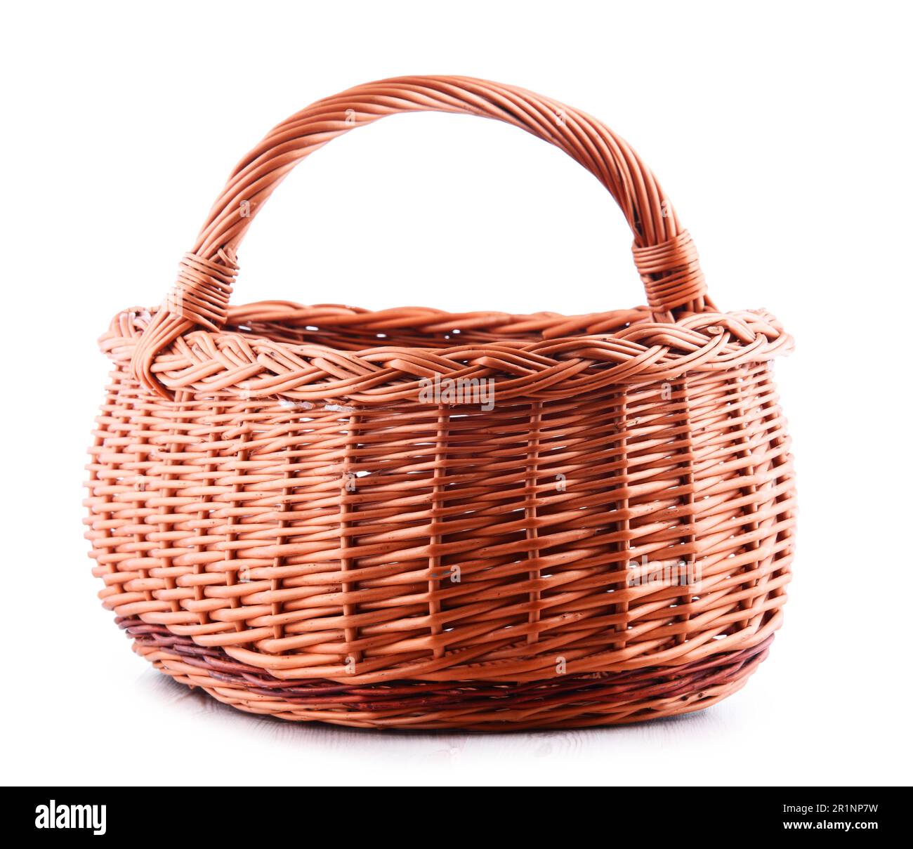 Empty wicker basket isolated on white background Stock Photo - Alamy