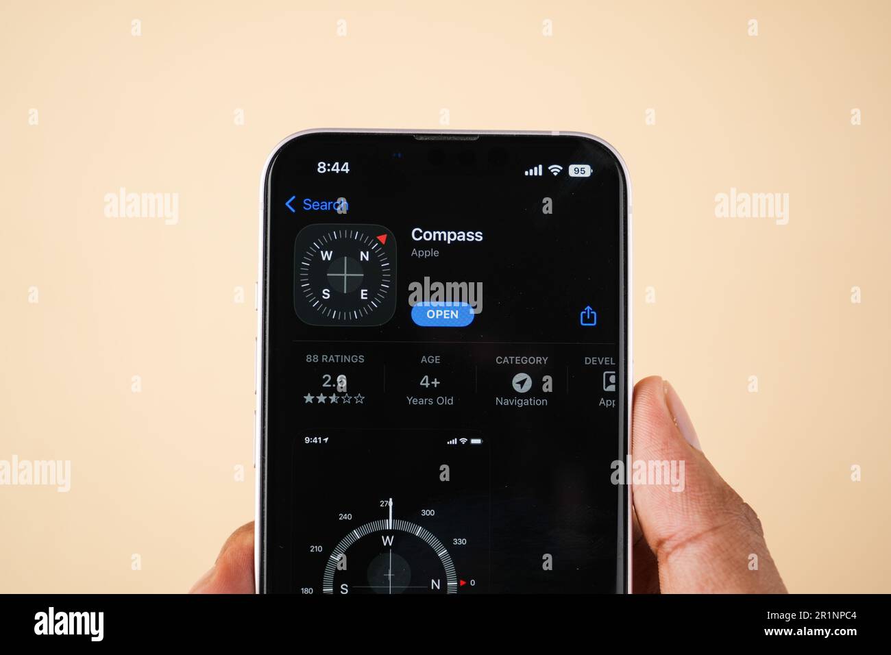West Bangal, India - February 20, 2023 : Apple Compass app on phone screen stock image. Stock Photo