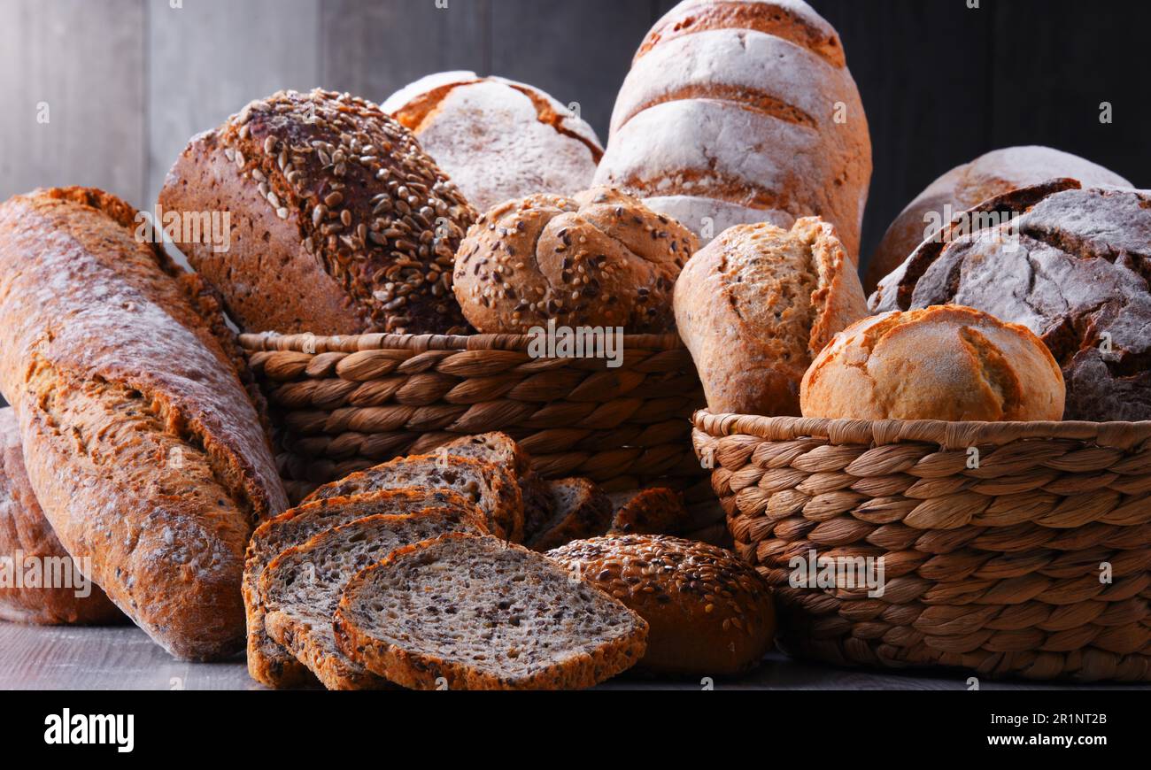 Composition with assorted bakery products in wicker basket Stock Photo