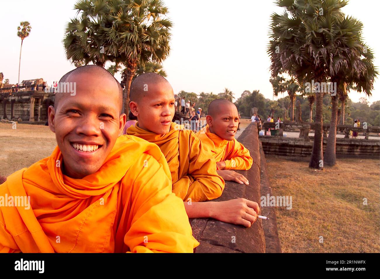 Monks Sunset at World's Largest Temple Angkor Wat Siem Reap Cambodia Stock Photo
