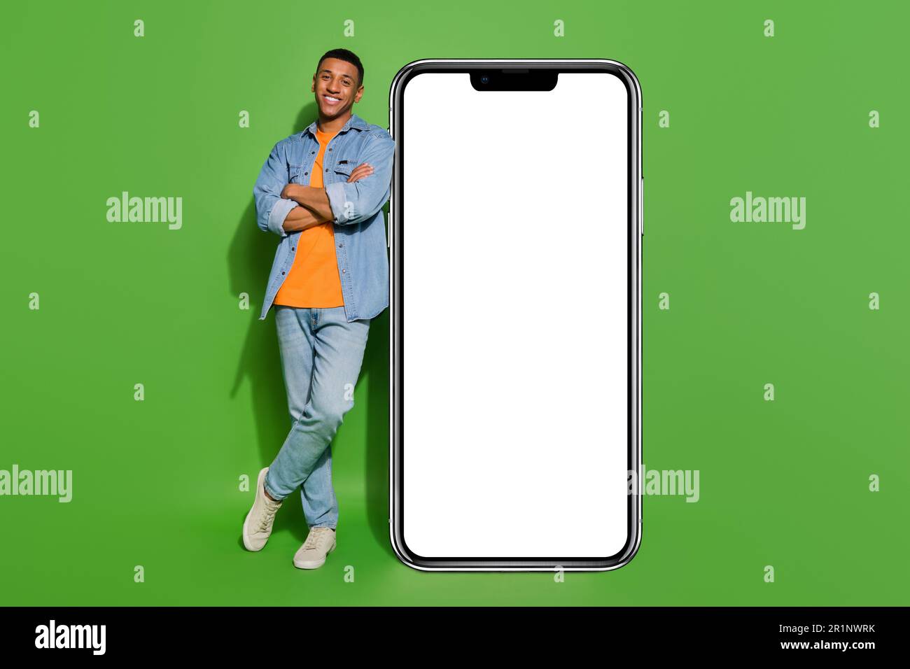 Lean Into Screen Full body photo of positive confident male lean on huge display screen ...