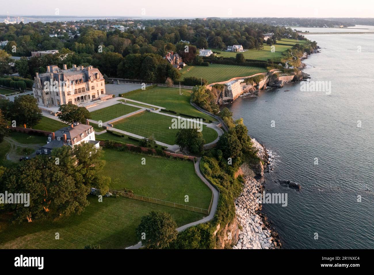 Newport Cliff Walk Ochre Court mansion at sunrise by aerial drone Stock