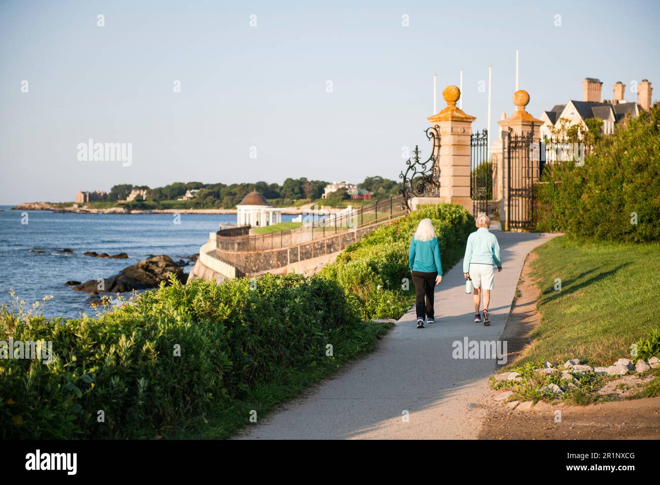 Older couple walking the public access path at Newport Cliff Walk Stock Photo