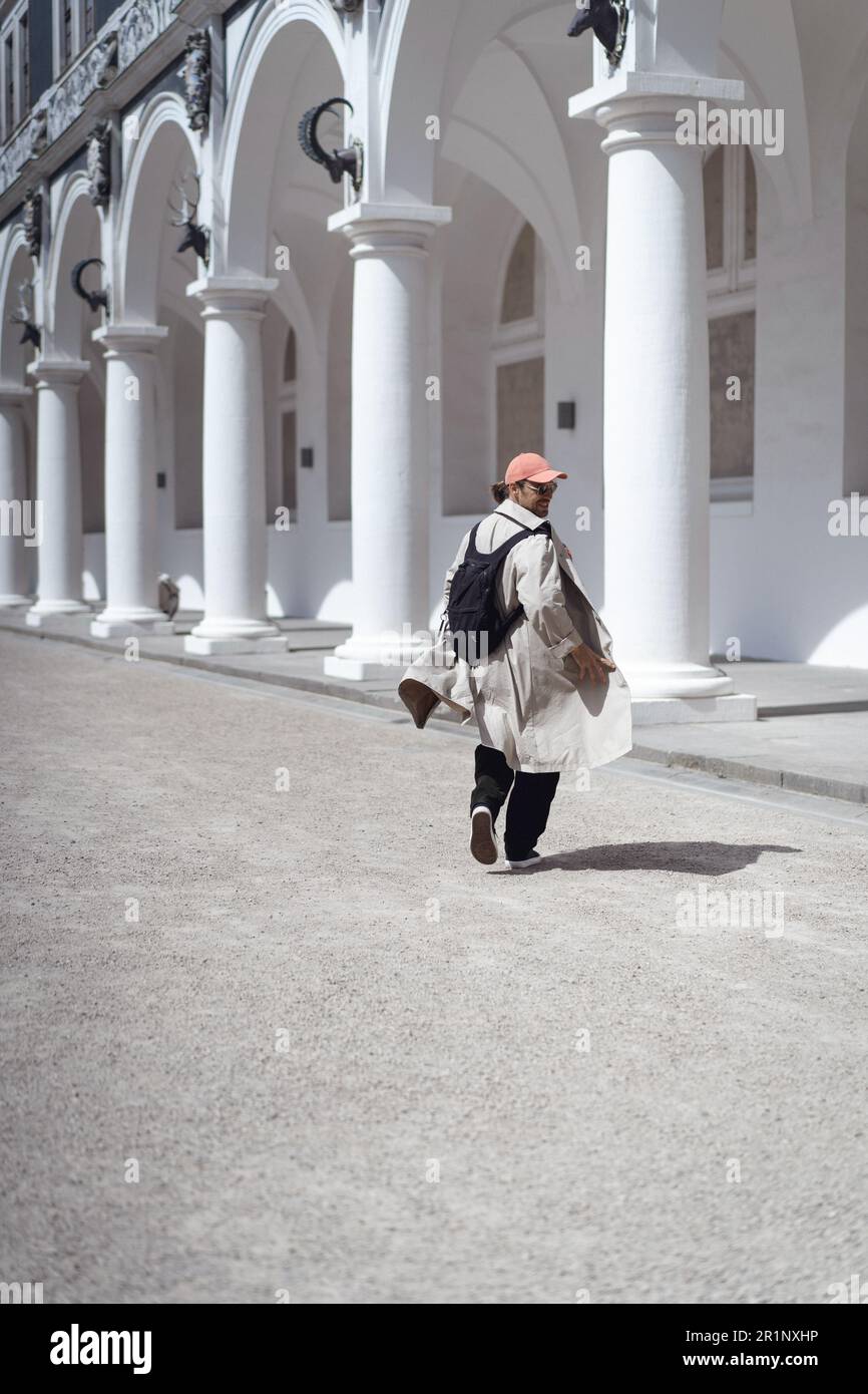 Man tourist in the Stallhof stable yard in Dresden. Stock Photo