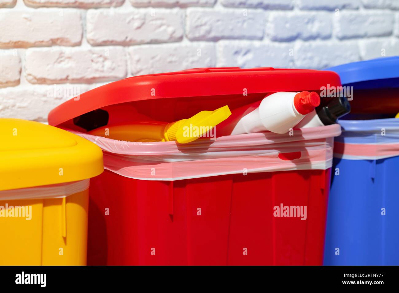 Trash cans full of waste in the building Stock Photo Alamy