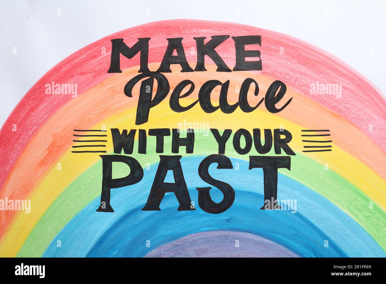 Painted rainbow and life-affirming phrase Make Peace With Your Past on white background Stock Photo