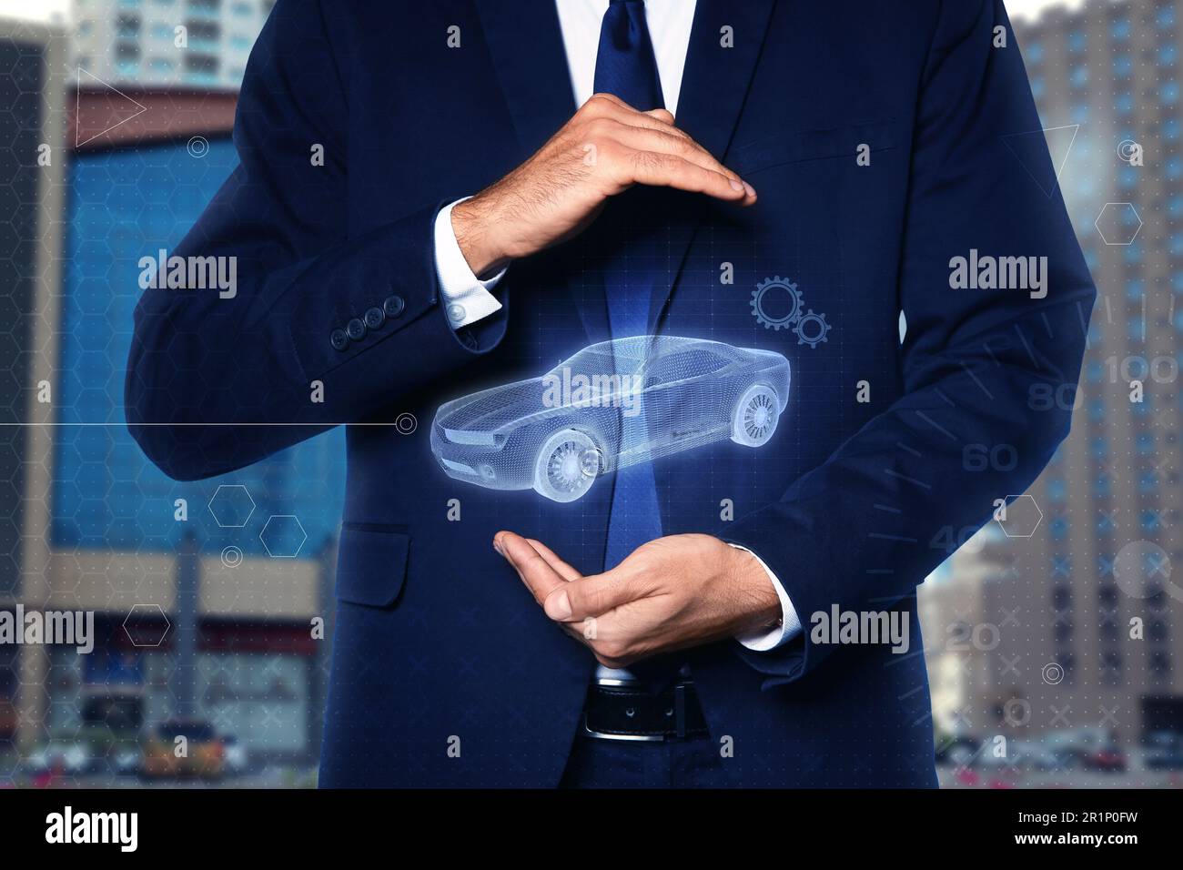 Man holding digital image of modern car outdoors, closeup Stock Photo