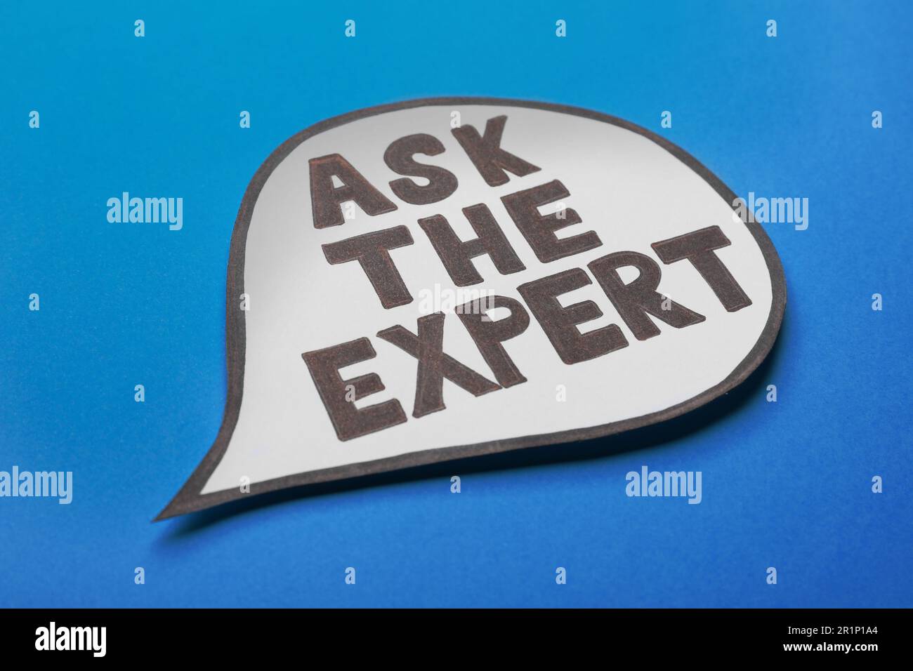 Speech bubble sticker with phrase Ask The Expert on light blue ...
