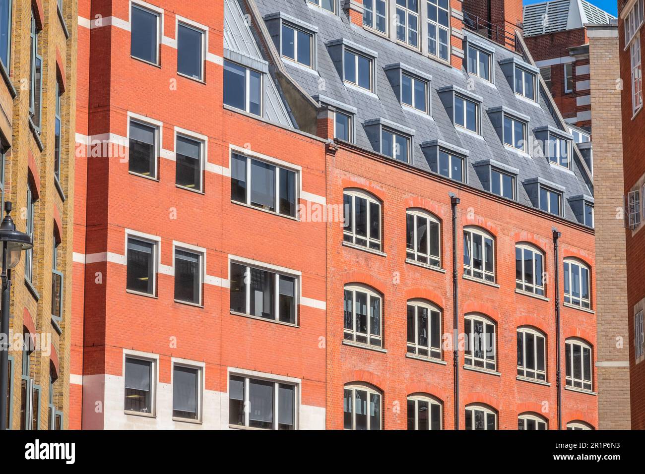 Contemporary red brick mansion block around Holborn in London Stock