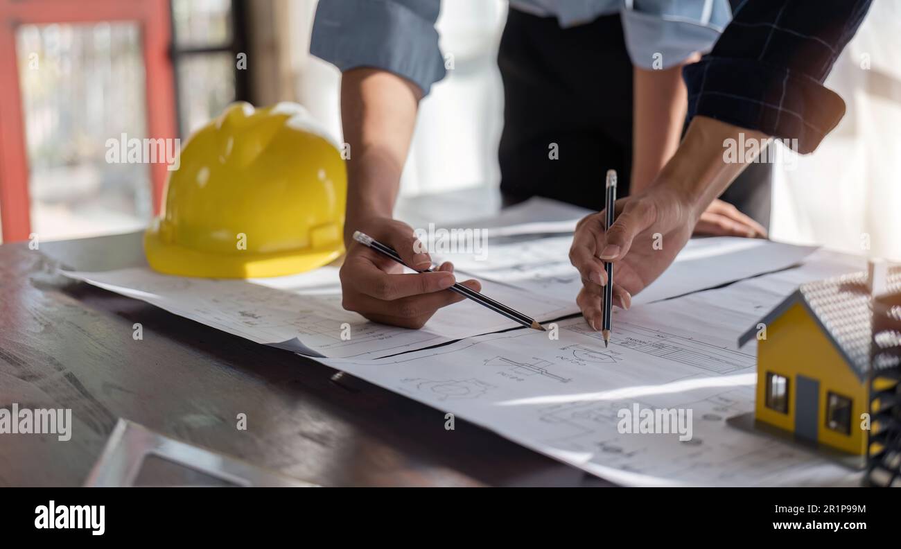 engineer team planning design house, modifying plan, creating construction project and addition according to customer requirement Stock Photo