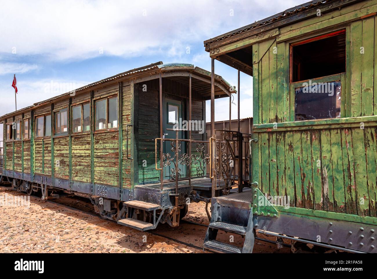 Obsolete train wagons from a bygone era in Wadi Rum, the famous Jordanian desert. Stock Photo