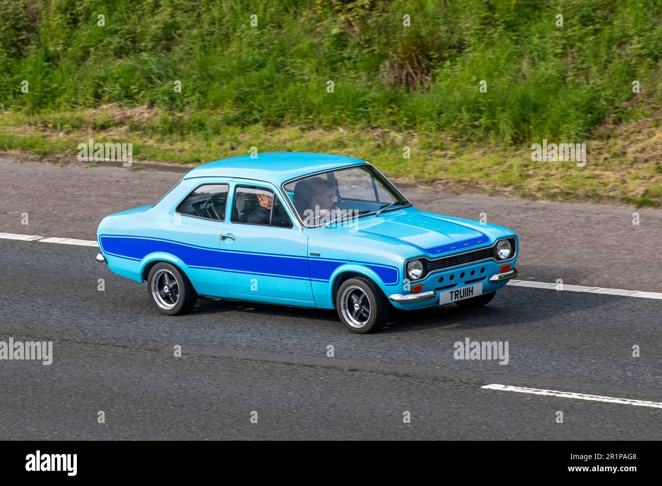 1970 70s seventies Ford Escort Blue RS2000 Car Petrol 1998 cc; travelling on the M61 motorway, UK Stock Photo