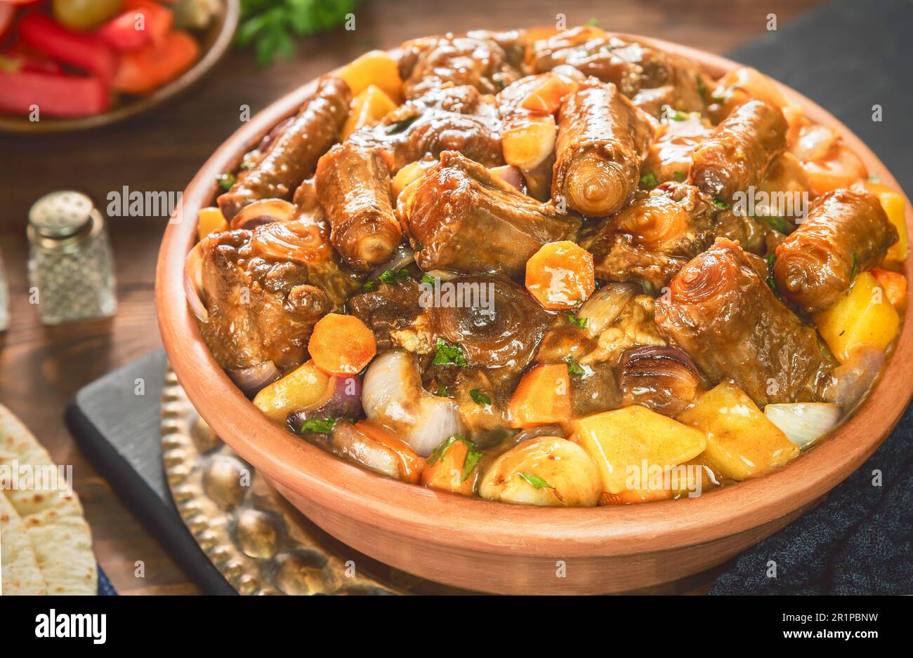 Arabic Cuisine; Egyptian traditional oxtails stew with vegetables. Served with traditional