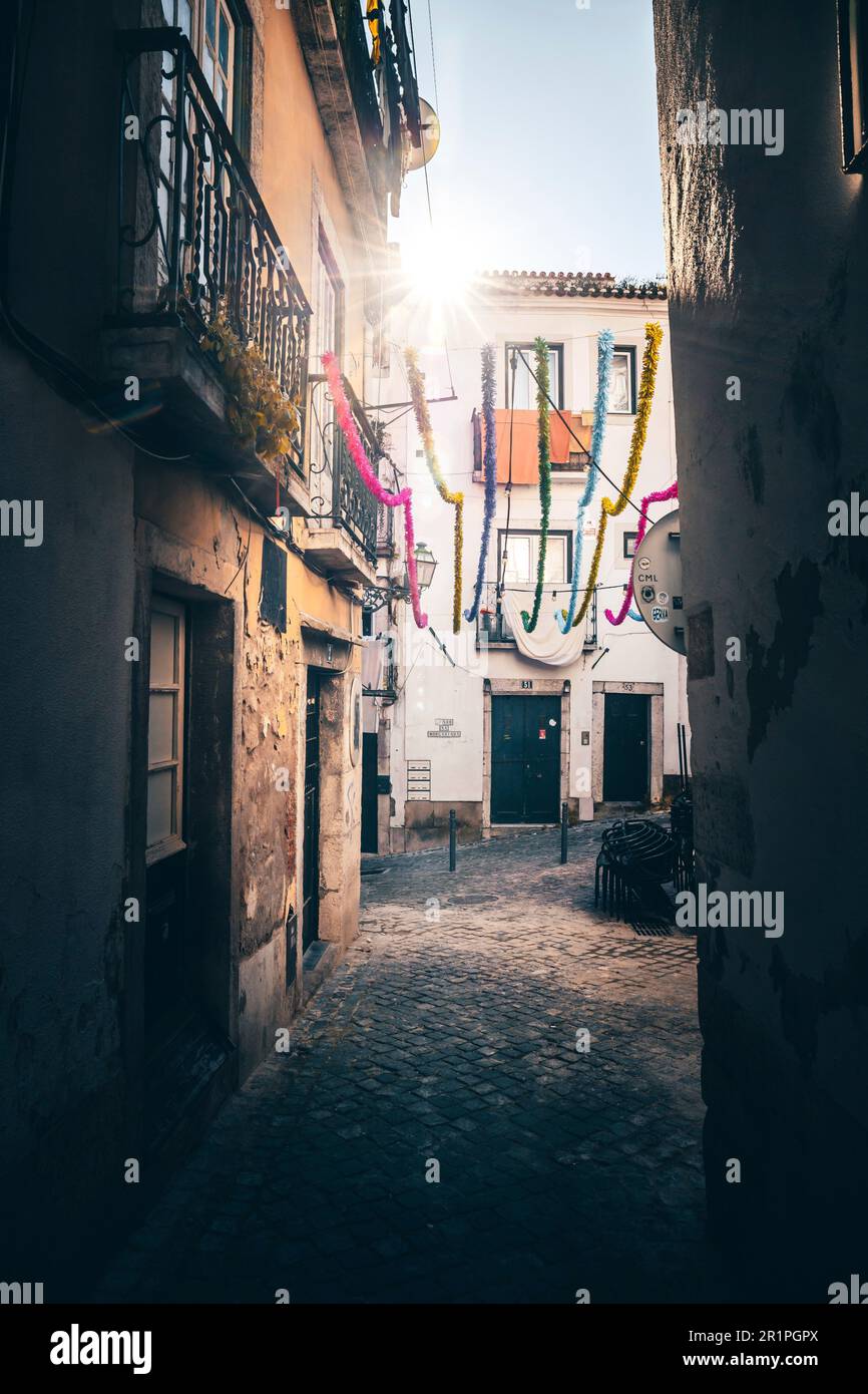 Narrow streets and old houses in the old town of Alfama. Urban living in a city with historic buildings and lots of culture. Lisbon, Portugal Stock Photo