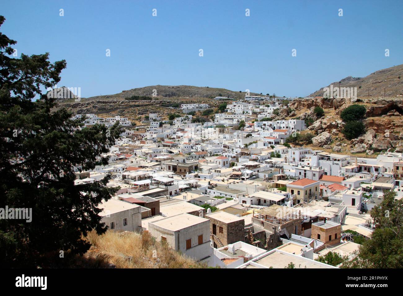 Greece, Rhodes Island, Lindos, city overview Europe, Dodecanese, island, Aegean Sea, southern Sporades, archipelago, coast, houses, residential, overview, exterior Stock Photo