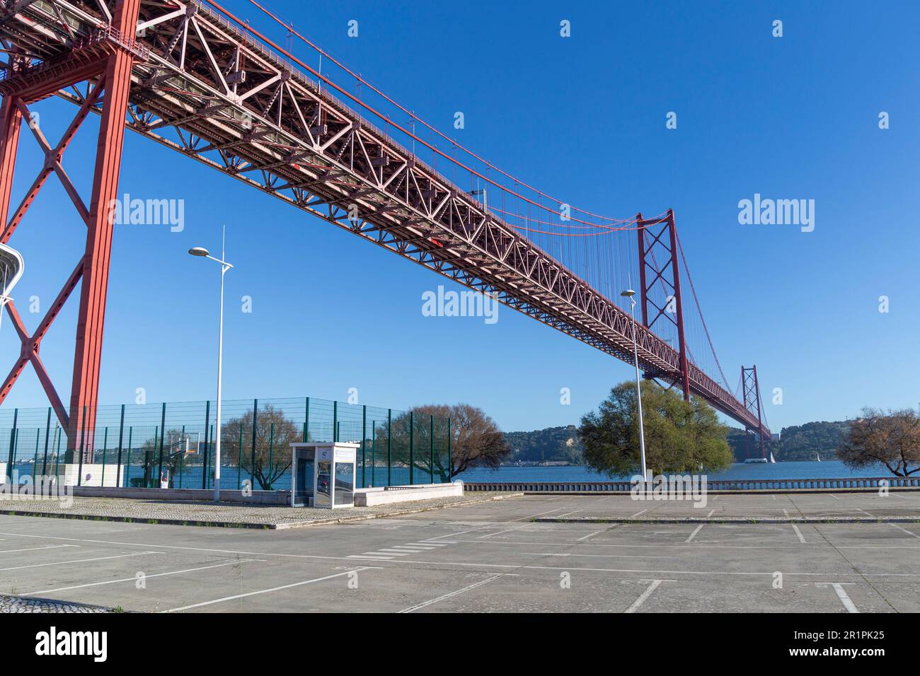 The 25 April bridge (Ponte 25 de Abril) is a steel suspension bridge located in Lisbon, Portugal, crossing the Targus river. It is one of the most famous landmarks of the region. Stock Photo