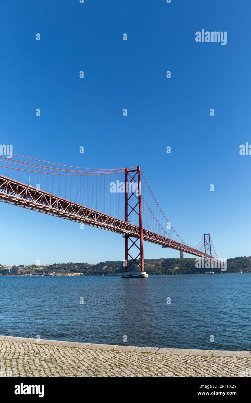 The 25 April bridge (Ponte 25 de Abril) is a steel suspension bridge located in Lisbon, Portugal, crossing the Targus river. It is one of the most famous landmarks of the region. Stock Photo