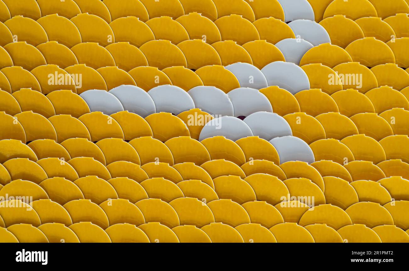 Bright write erase glitters of yellow and white color on a children's ...