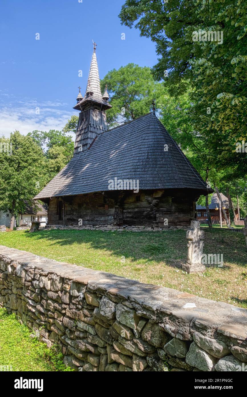 The Village Museum in King Michael I Park, Bucharest, Romania. A collection of reconstructed historical buildings. Transylvanian church. Stock Photo