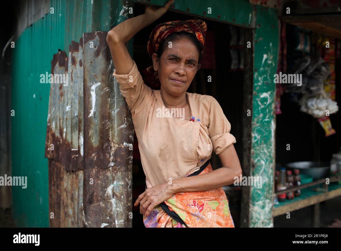 Dhaka, Dhaka, Bangladesh. 15th May, 2023. A Rohingya refugee seen stand in front her house in a refugee camp in Teknaf, Bangladesh. (Credit Image: © Abu Sufian Jewel/ZUMA Press Wire) EDITORIAL USAGE ONLY! Not for Commercial USAGE! Credit: ZUMA Press, Inc./Alamy Live News Stock Photo