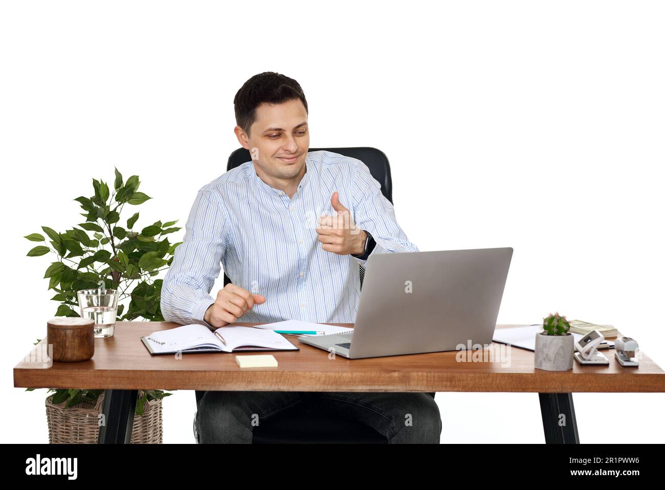 businessman talking at laptop webcam, using laptop Stock Photo