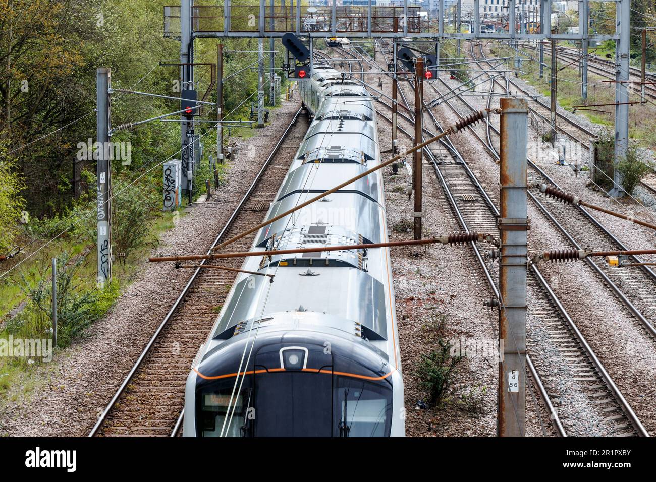 A passenger train approaching Finsbury Park station in North London, UK