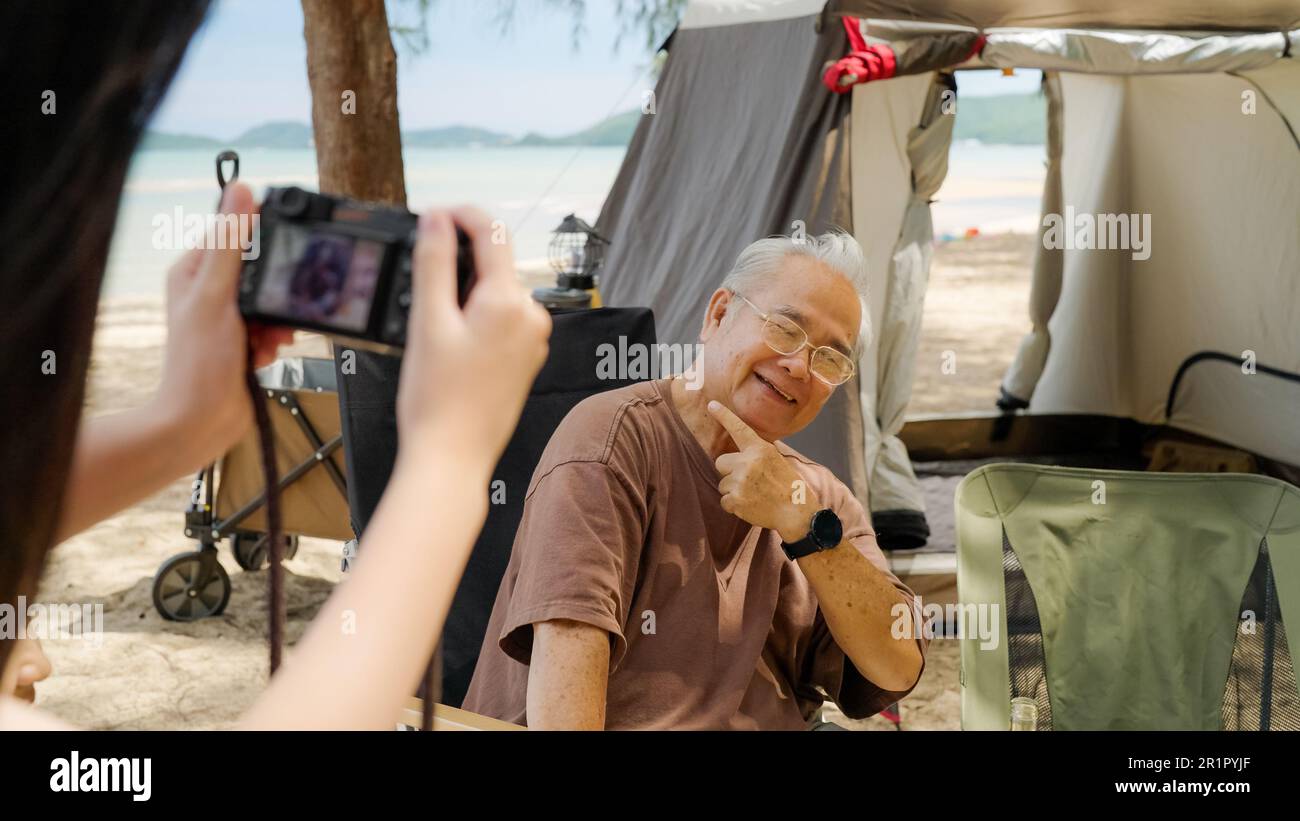 Happy asian family playing at the beach hi-res stock photography and ...