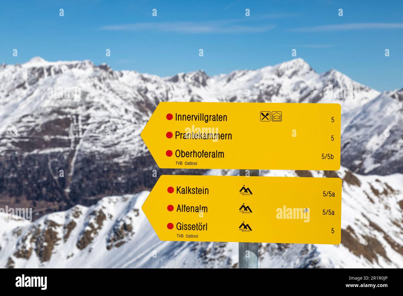 Austria, East Tyrol, Villgraten valley, yellow trail signs of the austrian alpine club in the Villgraten mountains, Western Tauern Alps Stock Photo