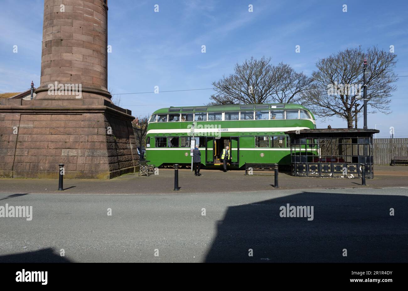 Vintage English Electric Balloon Tram number 700 and the Pharos or Upper Lighthouse Fleetwood Lancashire England Stock Photo