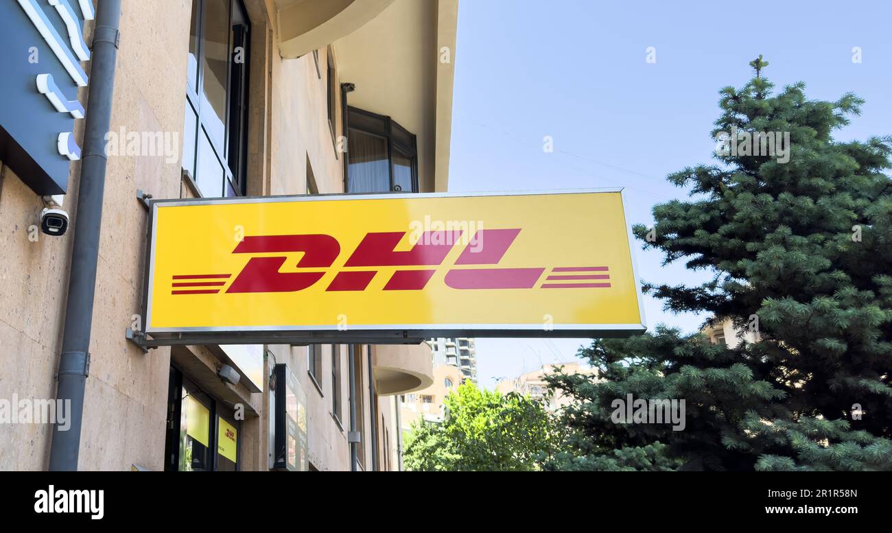 Yerevan, Armenia, May8, 2023: DHL logo on a facade. DHL Express. Sign