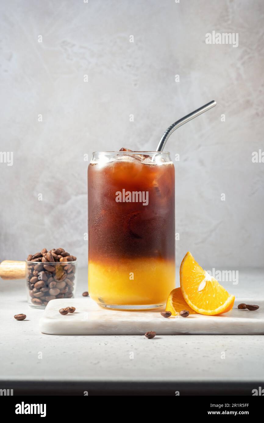 Bumble coffee mix with orange juice and cold brew coffee with ice Stock