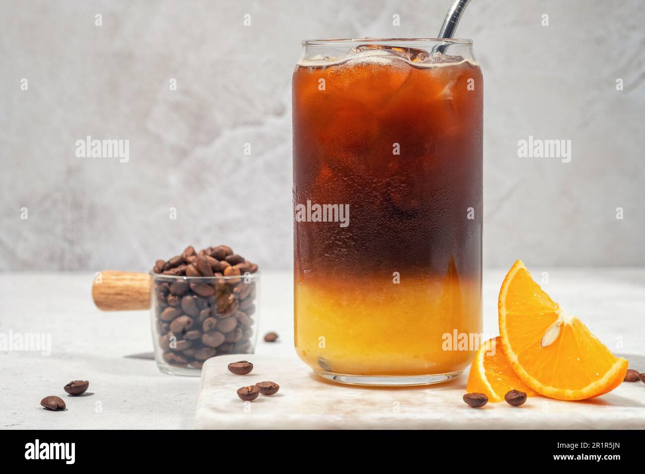 Bumble coffee mix with orange juice and cold brew coffee with ice Stock