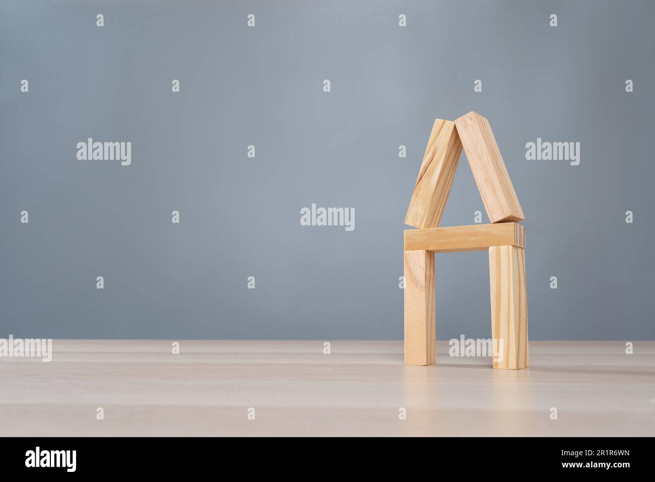 House model built with jenga blocks Stock Photo Alamy