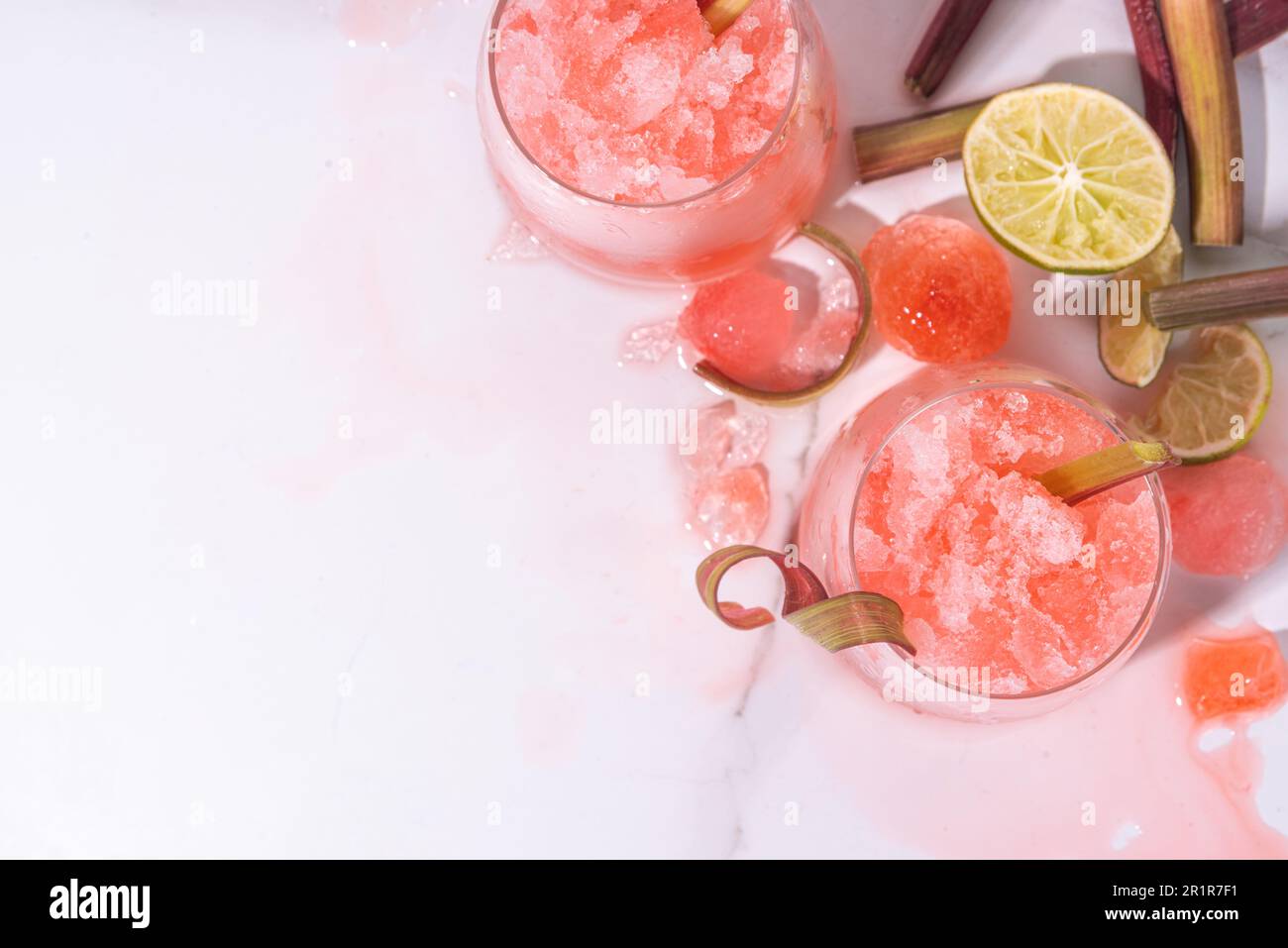 https://c8.alamy.com/comp/2R1R7F1/refreshing-summer-rhubarb-sour-fizz-cocktail-frozen-fizz-cocktail-sweet-rhubarb-slushy-with-sirup-rum-and-champagne-refreshing-cold-and-healthy-s-2R1R7F1.jpg