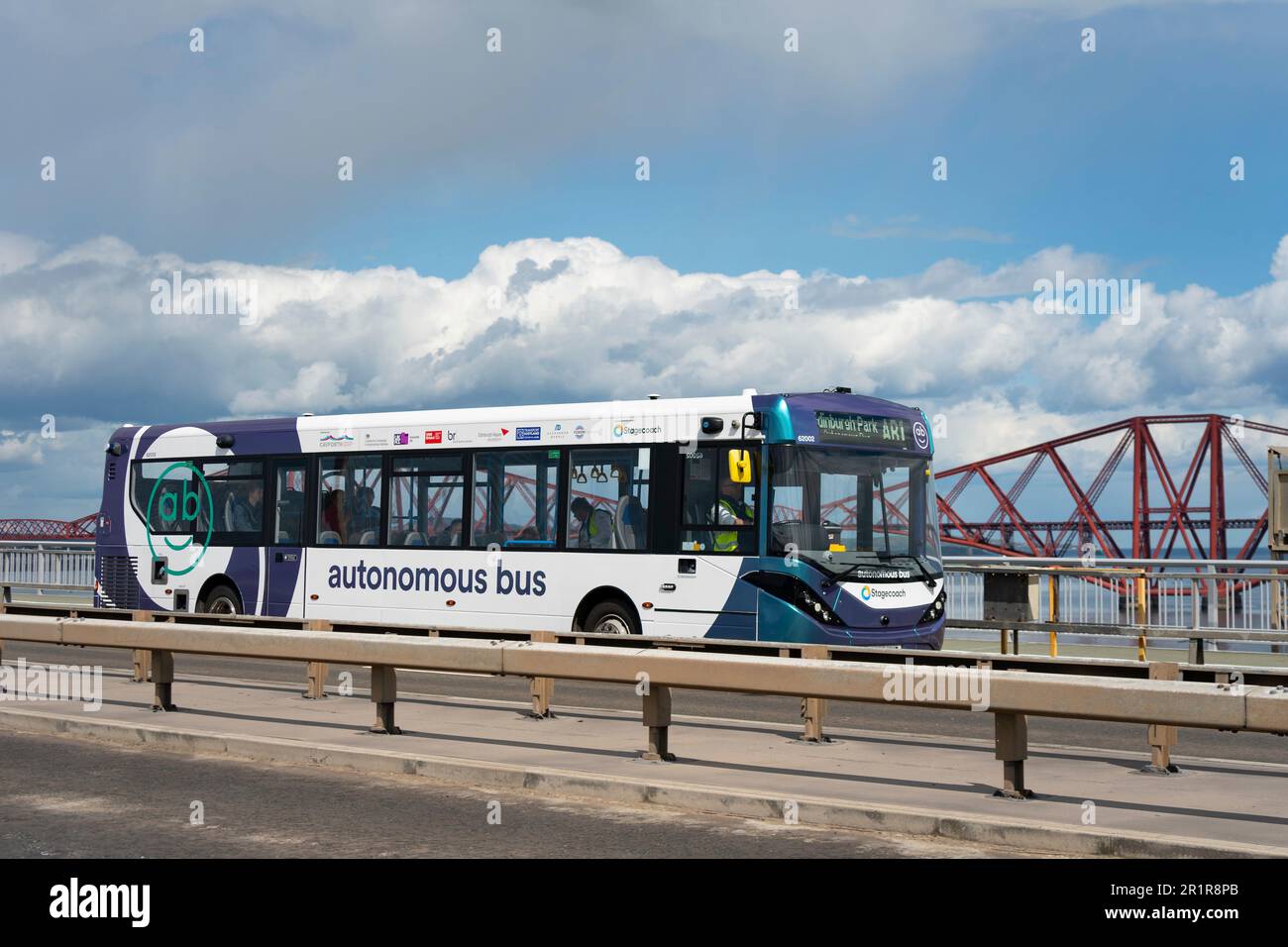 North Queensferry, Scotland, UK. 15 May 2023. Stagecoach autonomous self driving bus starts scheduled service between Ferrytoll Park and Ride at North Queensferry and Edinburgh Gate station in Edinburgh. The bus is the first full sized self driving passenger bus to operate in the UK. Initially the bus will only be autonomous on sections of motorway on the routs with the driver always ready to take control. Bus passes over the Forth Road bridge.. Iain Masterton/Alamy Live News Stock Photo