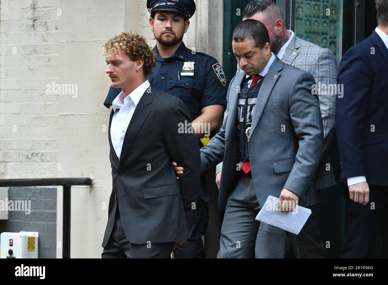 Daniel Penny surrenders to police at the 5th precinct to face
